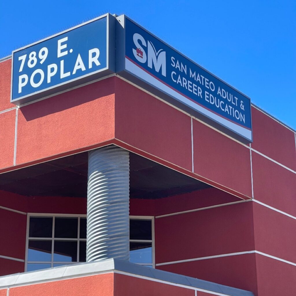 Exterior building sign for San Mateo Adult & Career Education